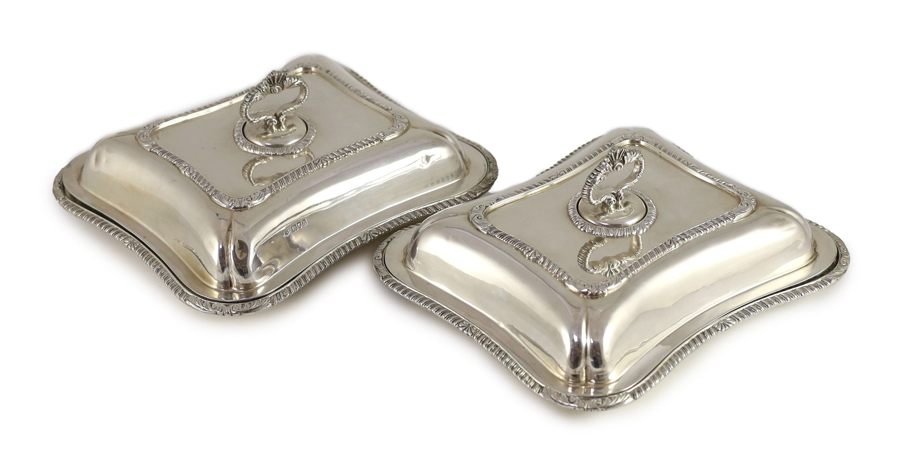 A pair of Edwardian silver tureens and cover with handles, by Daniel & John Welby